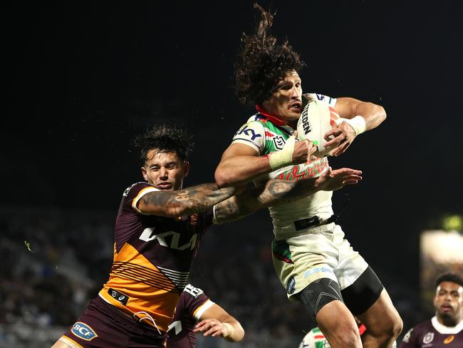 Dallin Watene-Zelezniak claims a bomb before scoring a try. Picture: Hannah Peters/Getty Images