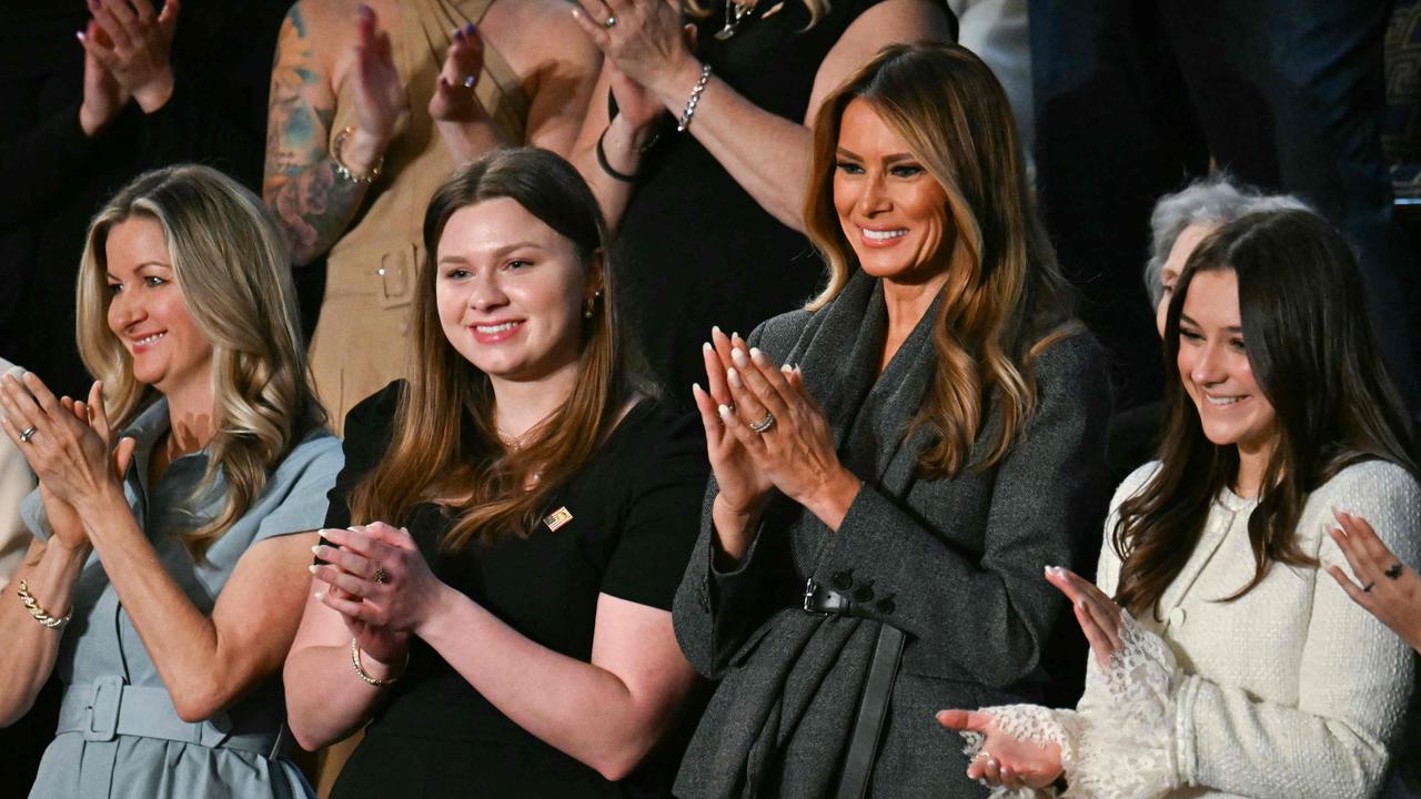 A beaming Melania received a standing ovation as she was joined by Haley Ferguson, a recipient of the first lady’s Fostering the Future initiative and Ellison Berry, a victim of AI-generated pornography. Picture: AFP