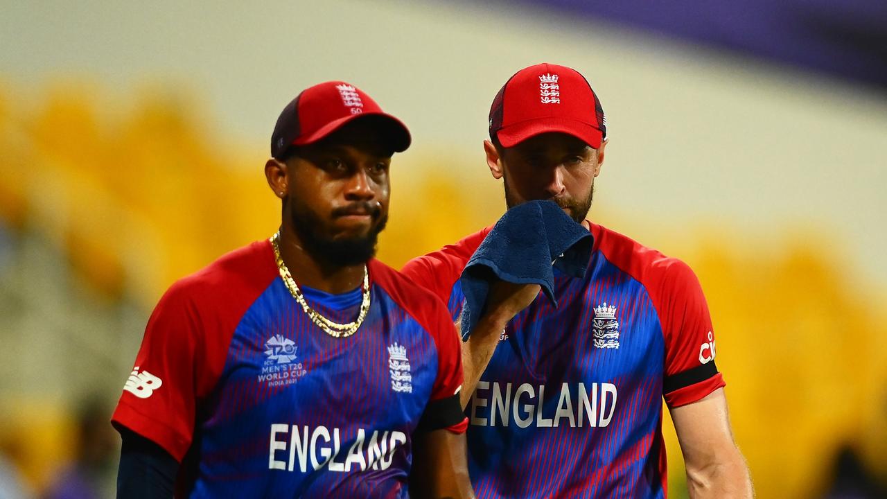 ABU DHABI, UNITED ARAB EMIRATES - NOVEMBER 10: Chris Jordan and Chris Woakes of England look dejected following the ICC Men's T20 World Cup semi-final match between England and New Zealand at Sheikh Zayed stadium on November 10, 2021 in Abu Dhabi, United Arab Emirates. (Photo by Alex Davidson/Getty Images)