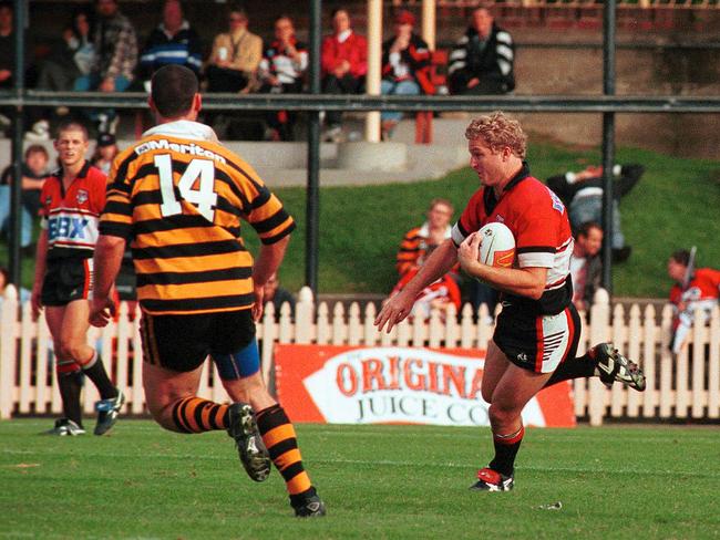 Sean Rutgerson (R) on the burst for North Sydney. Pic: Virginia Young