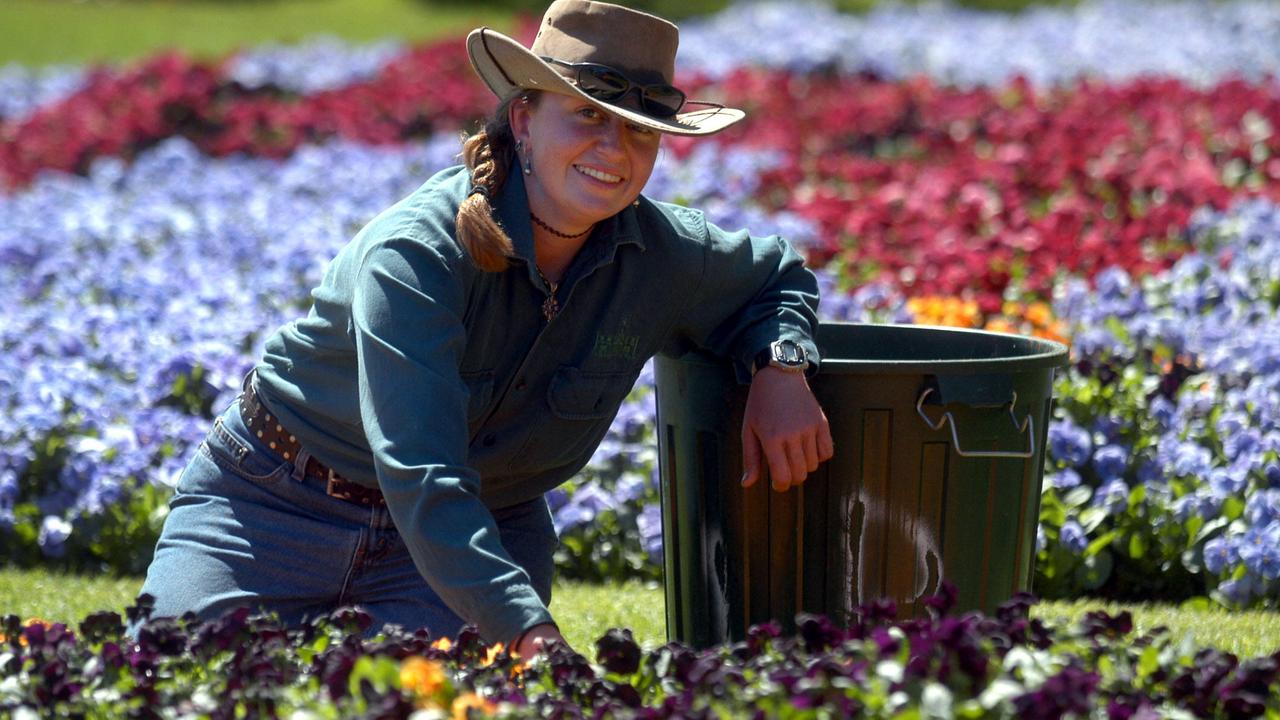 Assistant gardener Elissa Bellert putting the finishing touches to the floral gardens at Laurel Bank Park, Toowoomba in preparation for the Annual Carnival of Flowers this coming weekend. Picture: David Martinelli.