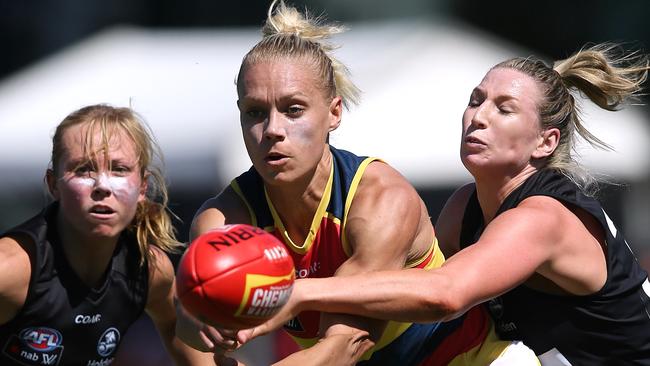 Erin Phillips gets her handball away. Picture: Wayne Ludbey