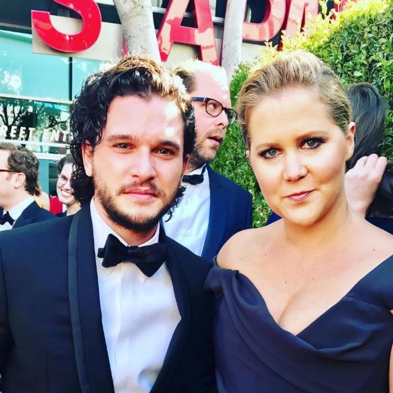 Amy Schumer with Kit Harington, "Jon Snow and my creepy brother photobombing as usual" Picture: Instagram