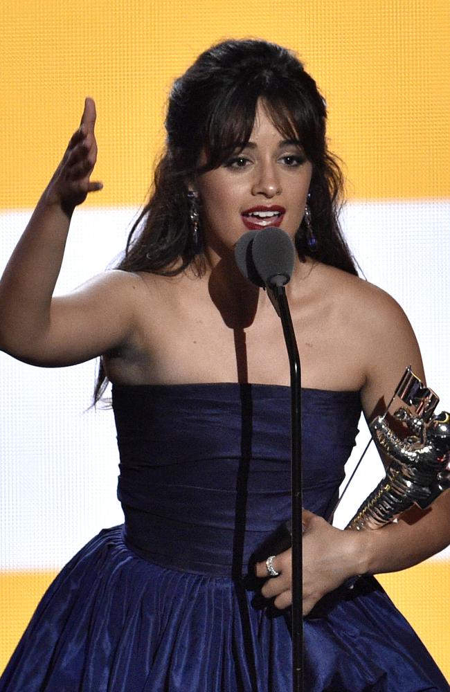 Camila Cabello accepts the award for artist of the year. Picture: AP