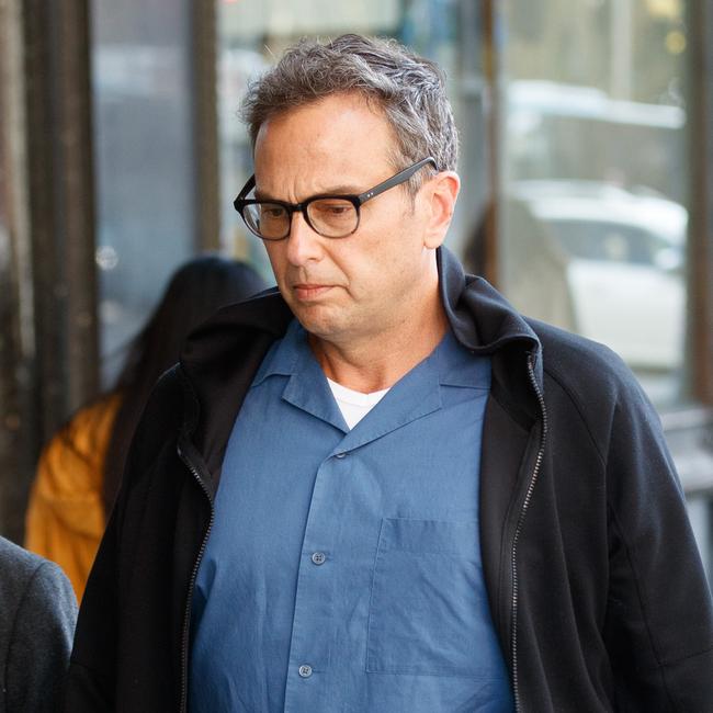 SYDNEY, AUSTRALIA – NewsWire Photos. August 22 2024. Former Waverley councillor Sam Einfield (R) leaves Downing Centre Local Court where he is being sentenced for an aggravated break &amp; enter attack. Picture: NewsWire / Max Mason-Hubers