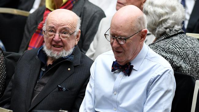 Tom Keneally, left, at the state memorial service for poet Les Murray at the NSW State Library in Sydney yesterday. Picture: AAP