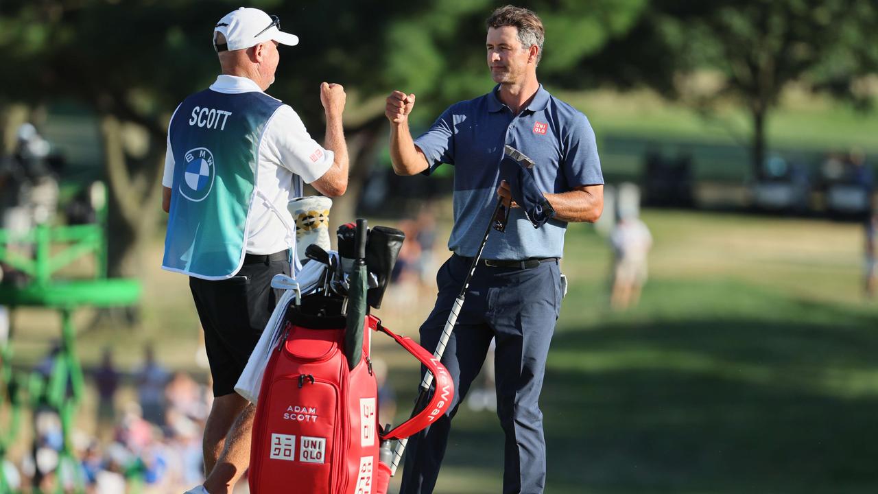 Adam Scott of Australia reacts to his putt on the 18th green during the third round of the BMW Championship at Wilmington Country Club. Photo: Getty Images