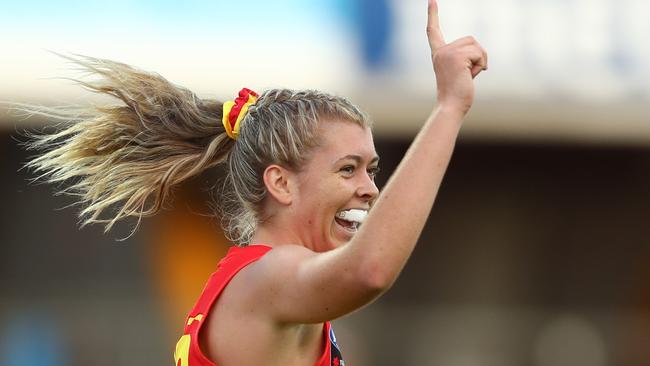 Kalinda Howarth of the Suns celebrates a goal during the round three AFLW match between the Gold Coast Suns and the Brisbane Lions at Metricon Stadium on February 22, 2020 in Gold Coast, Australia. (Photo by Chris Hyde/Getty Images)