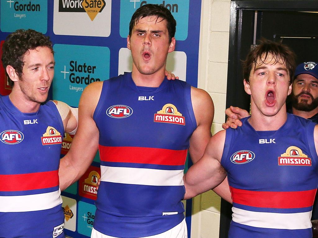 Tom Boyd with Robert Murphy and Liam Picken after a Bulldogs win.