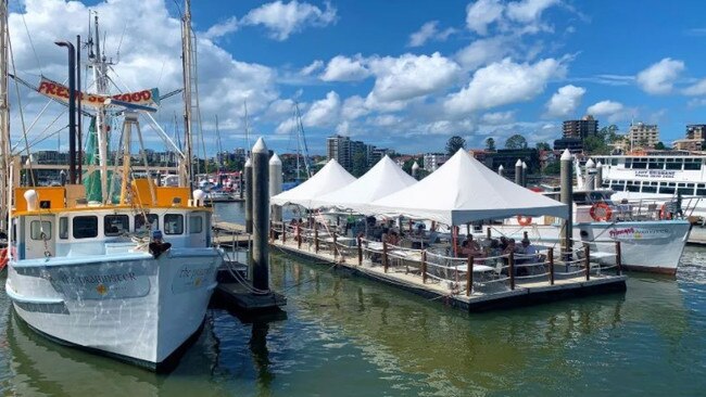 Seafood dine-in business Prawnster started with one vessel, but now has two moored side-by-side. Owner Martin Brennan is suing the State Government.