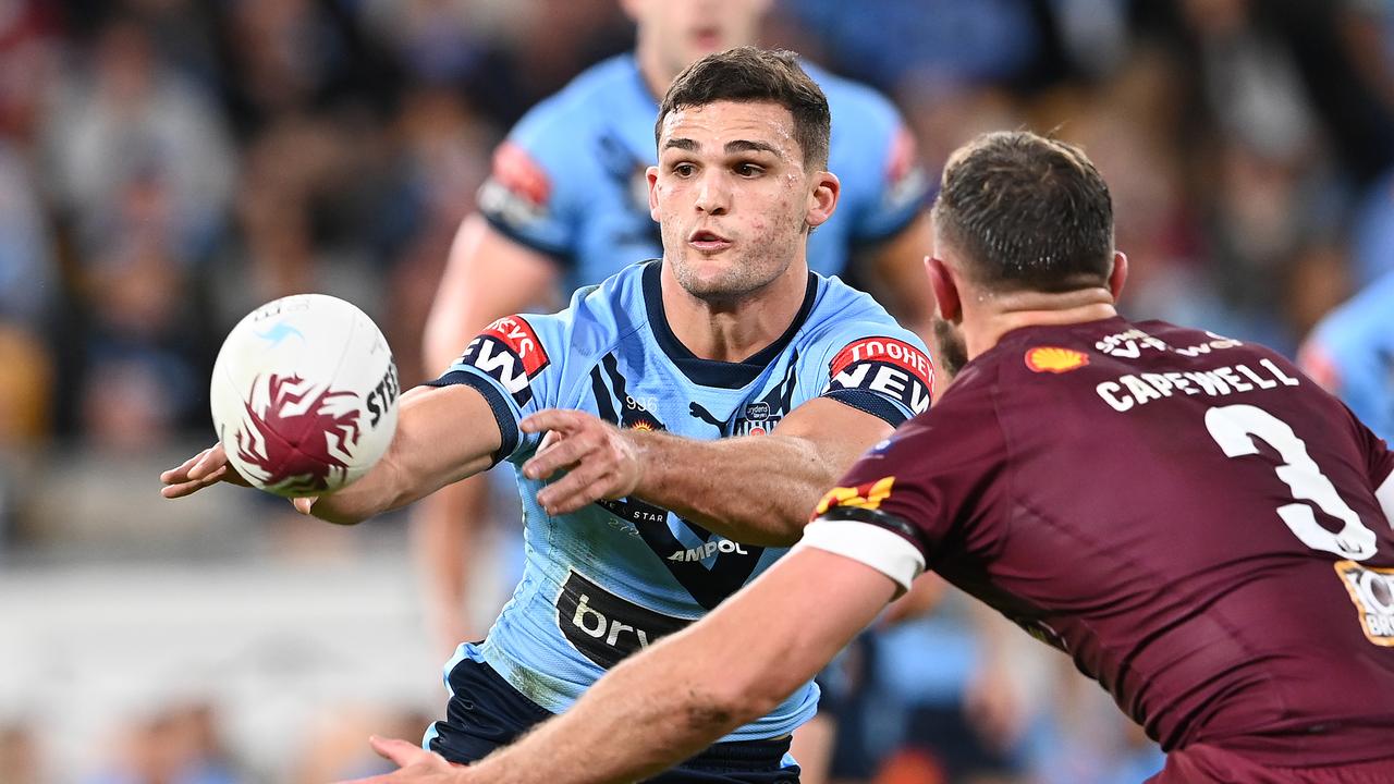 BRISBANE, AUSTRALIA - JUNE 27: Nathan Cleary of the Blues offloads the ball during game two of the 2021 State of Origin series between the Queensland Maroons and the New South Wales Blues at Suncorp Stadium on June 27, 2021 in Brisbane, Australia. (Photo by Bradley Kanaris/Getty Images)