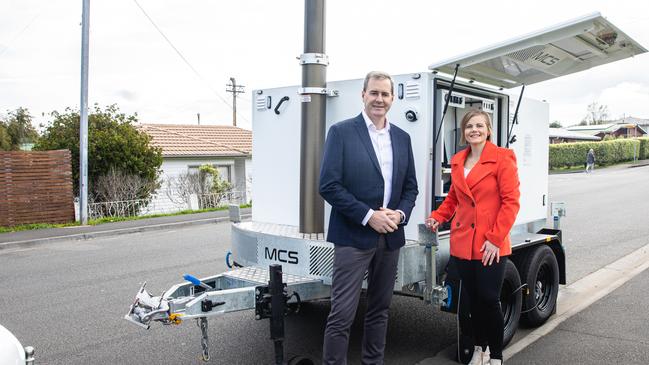 Michael Fergusson, minster for Infrastructure and Transport and Glenorchy Mayor, Bec Thomas and with the new mobile speed camera. Picture: Linda Higginson