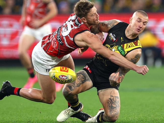 Jayden Laverde spoils a mark by Dustin Martin during Dreamtime on Saturday night. Picture: Quinn Rooney/Getty Images.