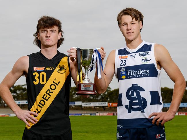 SANFL U16 captains Ben Ridgway from Glenelg and Tom Wheaton from South Adelaide with the Torrens University U16 cup, Wednesday, April 21, 2021. Picture: Brenton Edwards