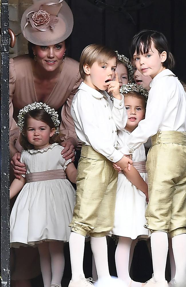 Kate Middleton wrangles the children at her sister’s wedding in May 2017. Picture: AFP/ Justin TALLIS