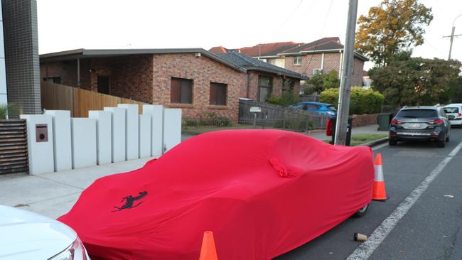 A covered Ferrari parked outside Selina Mehajer’s Lidcomb home. Picture: John Grainger