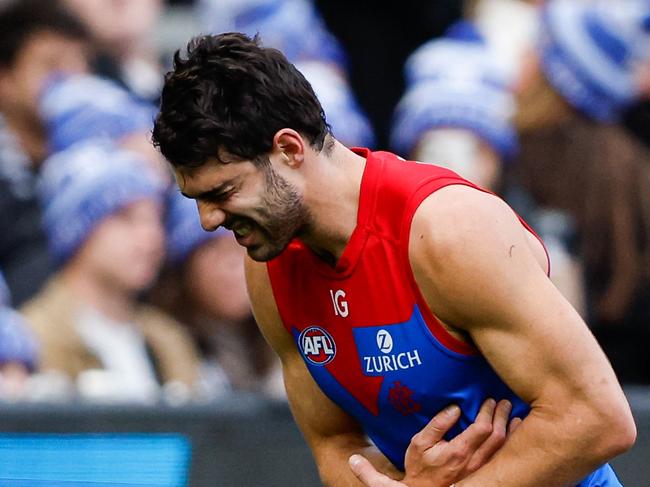 MELBOURNE, AUSTRALIA – JUNE 10: Christian Petracca of the Demons leaves the field injured during the 2024 AFL Round 13 match between the Collingwood Magpies and the Melbourne Demons at The Melbourne Cricket Ground on June 10, 2024 in Melbourne, Australia. (Photo by Dylan Burns/AFL Photos via Getty Images)