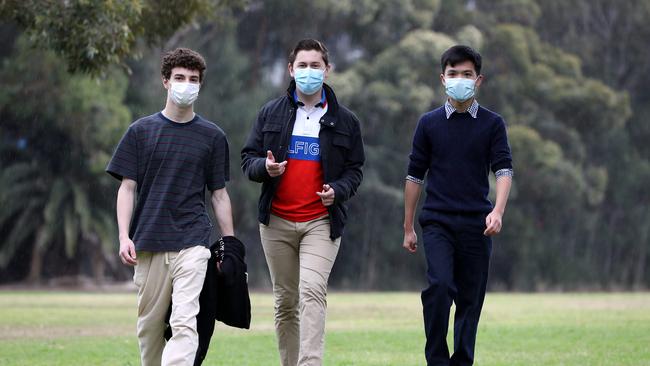 Sydney Technical High School students Adam Milosavijevic, left, Ambrose Konstantinidis and Huy Nguyen are to be a part of the Year 12 mass vaccination drive starting on Monday. Picture: Jane Dempster