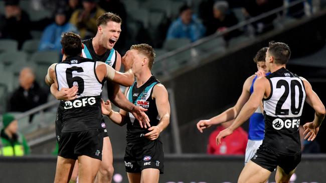 Peter Ladhams of the Power celebrates a goal against the Western Bulldogs at Adelaide Oval. Picture: AAP Image/Sam Wundke