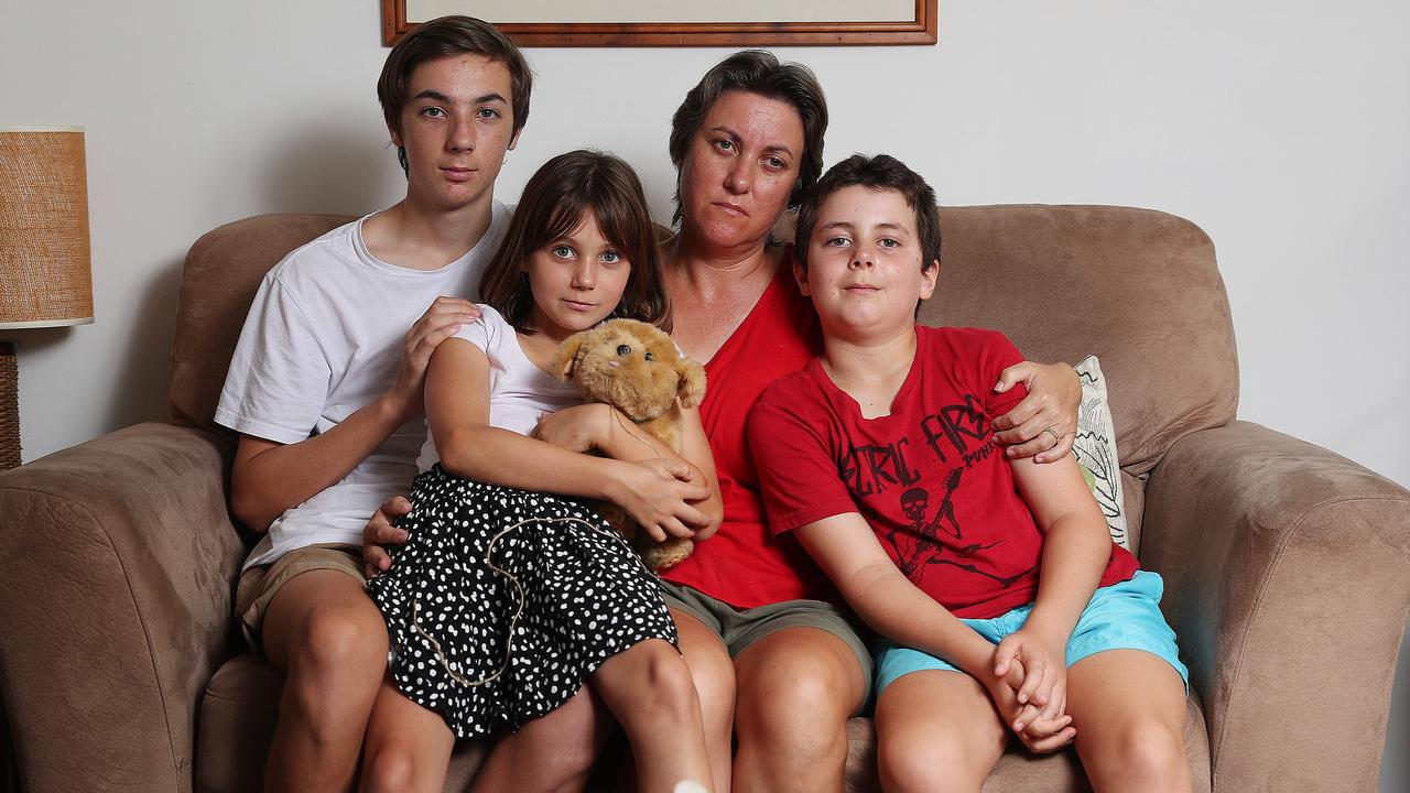 Catherine Frewer, widow of cyclist Cameron Frewer, with their three kids Lachlan, Heidi and Oscar. Picture: Peter Wallis