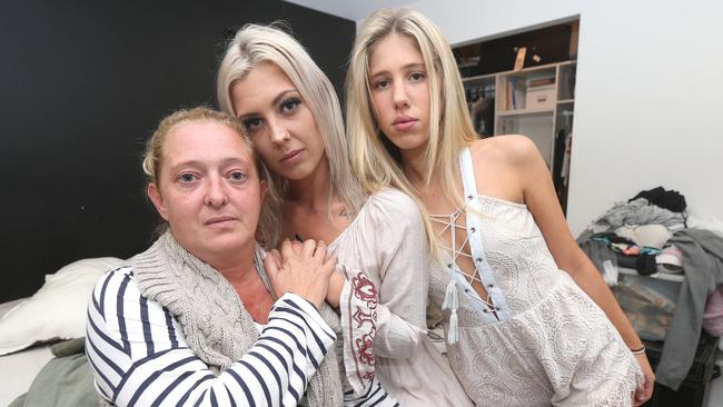 Karen Middleton, her daughter Reef Middleton and family friend Pandora Bonsor (on right) at their Mermaid Waters home after they where victims of a home invasion. Picture Mike Batterham