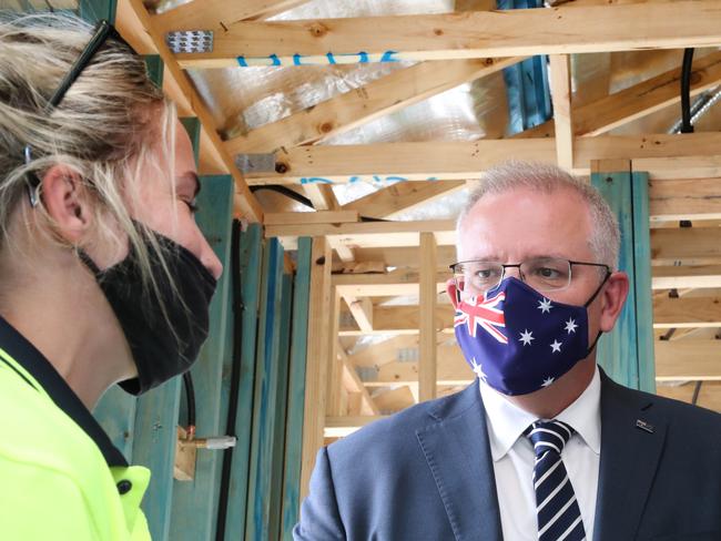 MELBOURNE, AUSTRALIA- NewsWire Photos FEBRUARY 11, 2021: .Prime Minister Scott Morrison meets with apprentice carpenter Margaret Hare on a visit to a housing construction site in Officer in the south eastern suburbs in Melbourne. Picture: NCA NewsWire/ David Crosling