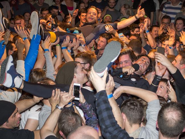 MELBOURNE, THURSDAY, MAY 4: Hamish and Andy crowd surf for the entirety of their FOX FM afternoon radio show at Max Watts .  In this pic Andy takes a selfie while crowd surfing with Hamish.MANDATORY PRINT AND ONLINE CREDIT: FIONA HAMILTION PHOTOGRAPHY. PIC IS SUPPLIED FREE OF CHARGE IF CREDITED.