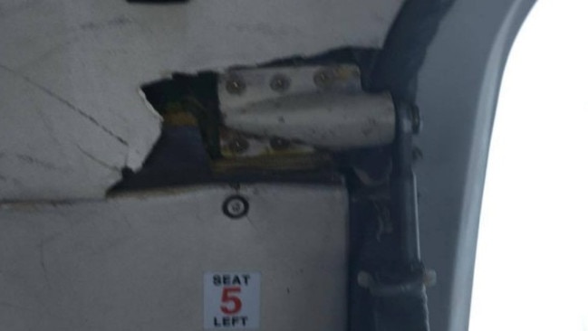 A close-up of the door that opened during the Barrier Air flight.