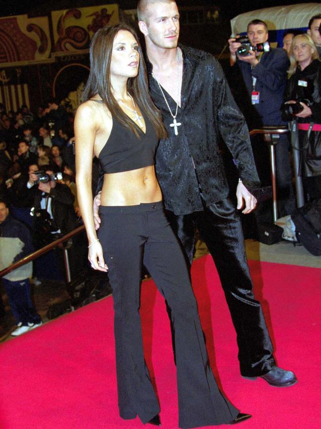 Victoria and David Beckham in the early years of their relationship. Picture: Getty Images