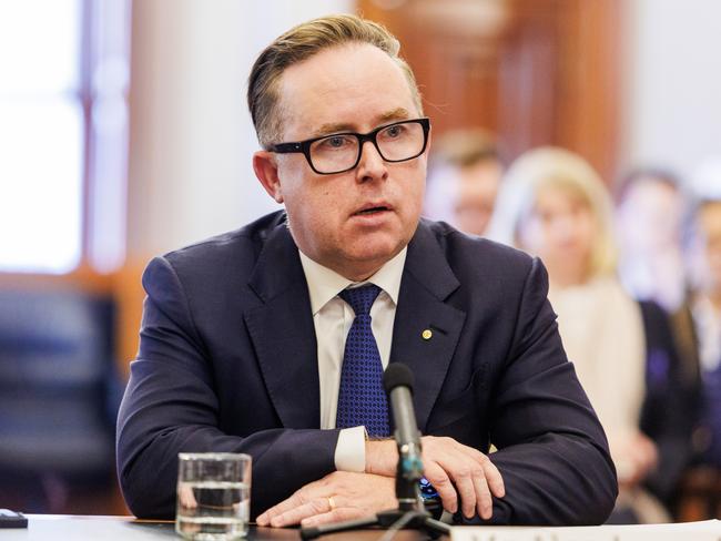 Ex-Qantas CEO Alan Joyce reacts during a senate hearing into the cost of living. Picture: Aaron Francis/NCA Newswire