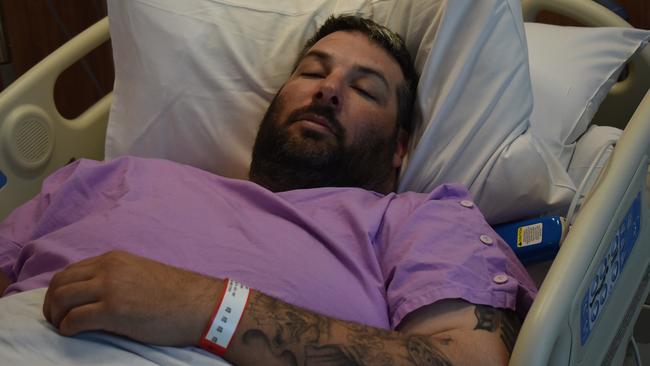 Nicholas Amos in Mackay Base Hospital after heroically intervening in a carjacking gone wrong outside Walkerston's O'Shea's pub on September 4, 2021. Picture: Lillian Watkins