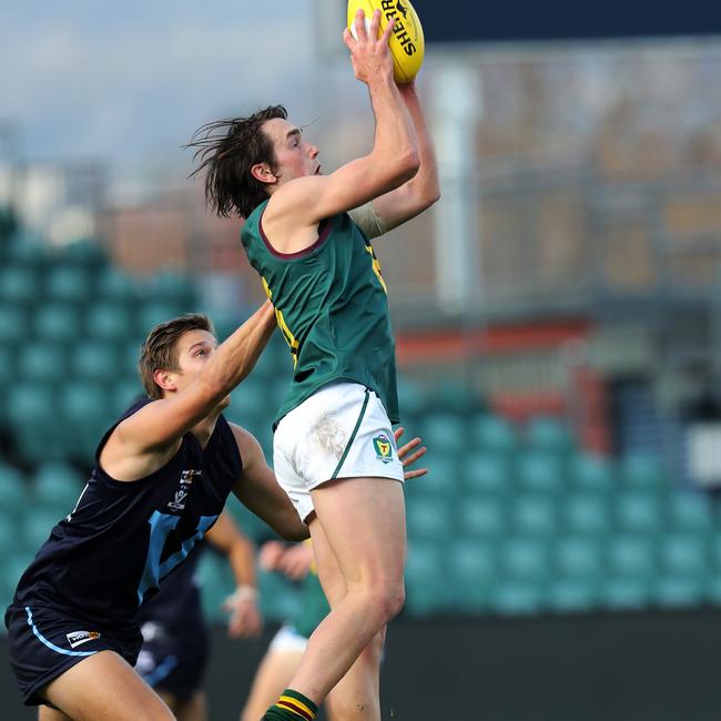 Tasmania Aiden Grace marks during the game against Vic Metro at UTAS Stadium. PICTURE CHRIS KIDD