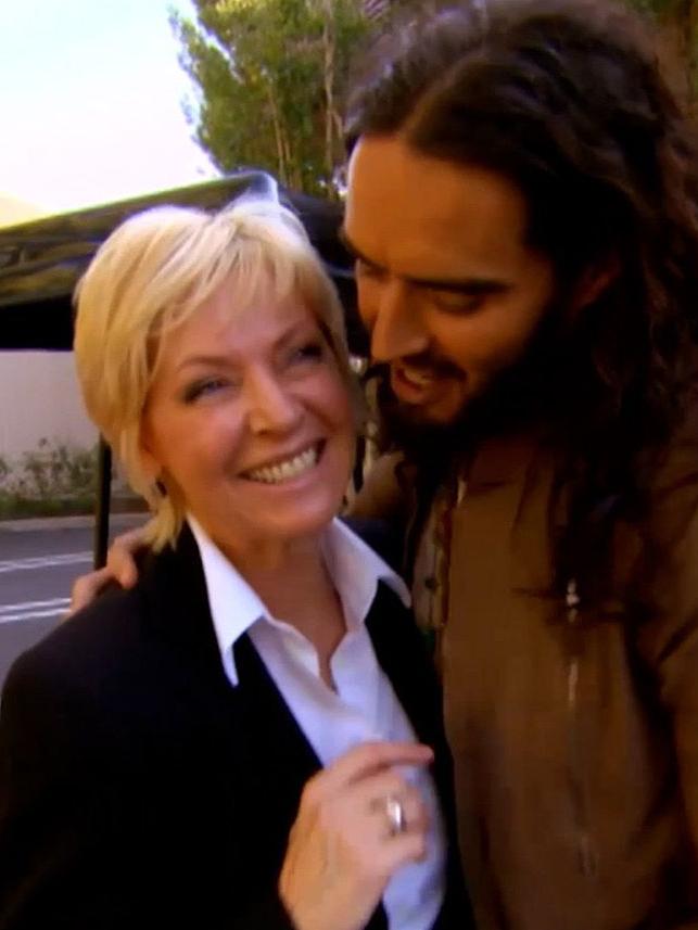 Russell Brand pulls Liz Hayes close. Picture: Nine