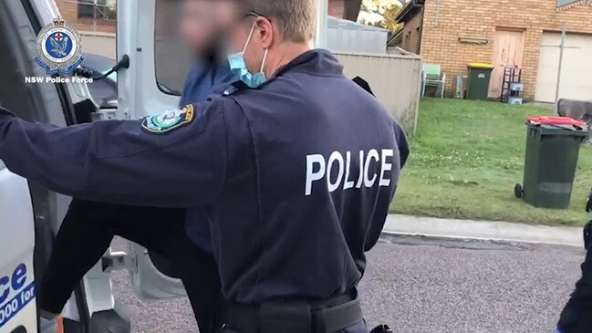 The Bandidos’ sergeant-at-arms for mid-north coast chapter Ben Adams being arrested at Thornton. Picture: NSW Police.