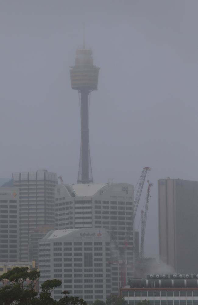 The Sydney Tower behind an intense storm on Wednesday. Picture: Steven Saphore/AAP