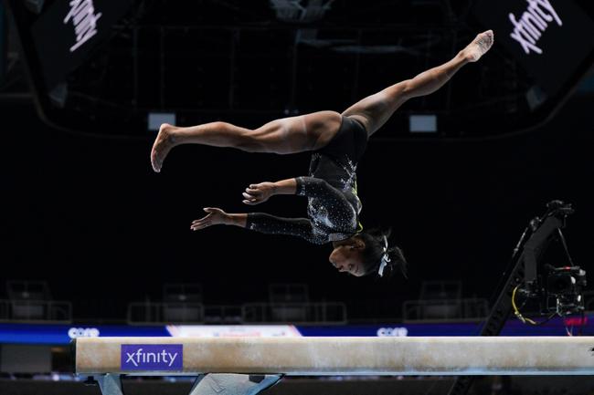 Simone Biles competes in the balance beam on the way to winning the all-around title on the final day of women's competition at the US Gymnastics Championships in San Jose, California