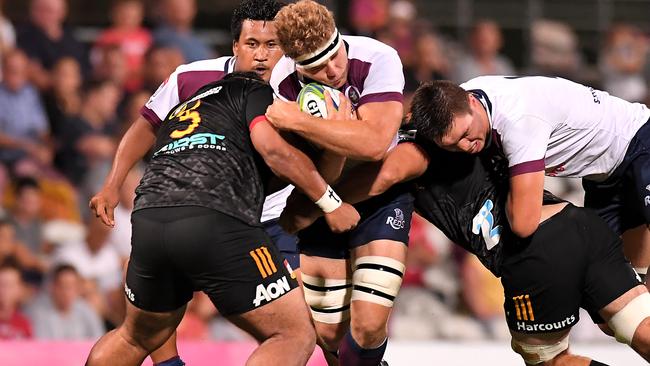 Angus Scott-Young ploughs into the Chiefs defence on Friday night.