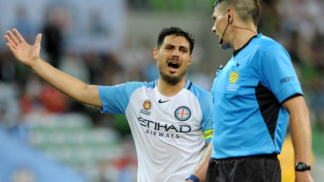 Bruno Fornaroli of City argues with referee Shaun Evans.