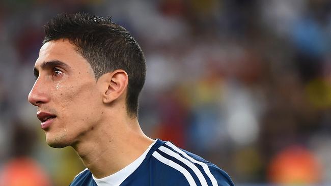 RIO DE JANEIRO, BRAZIL - JULY 13: An emotional Angel di Maria of Argentina looks on after being defeated by Germany 1-0 in extra time during the 2014 FIFA World Cup Brazil Final match between Germany and Argentina at Maracana on July 13, 2014 in Rio de Janeiro, Brazil. (Photo by Laurence Griffiths/Getty Images)