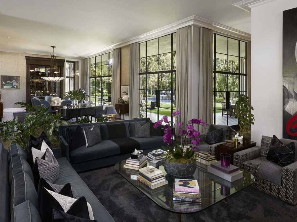 The living and dining room has floor-to-ceiling windows. Picture: The Agency