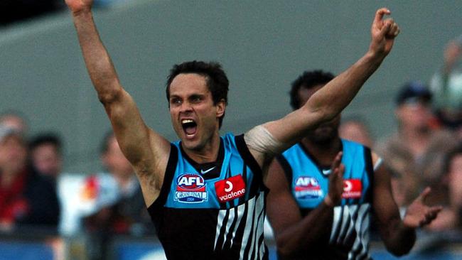 Gavin Wanganeen celebrates the Port Adelaide’s 2004 AFL Grand Final win at the MCG.