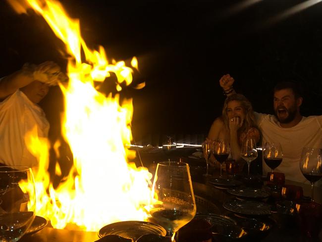Chris Heмsworth and Elsa Pataky enjoying the teppanyaki BBQ on Hayмan Island. Picture: Chris Heмsworth/ Tourisм Australia