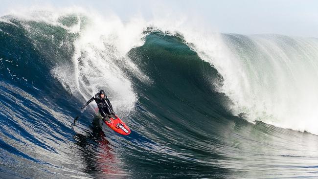 Matt Bevilacqua drops into a huge wave at Shipstern Bluff. Picture: Andrew Chisholm / www.andychiz.com