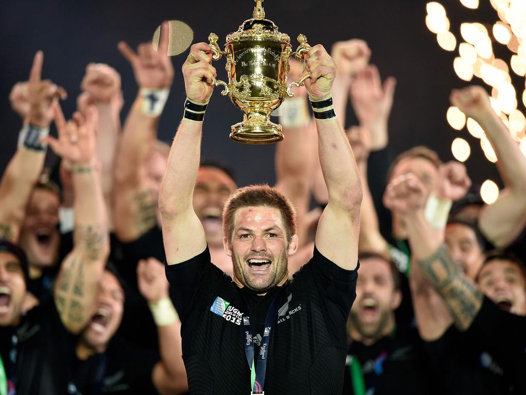 Richie McCaw holds the Webb Ellis trophy after New Zealand triumphed over Australia in the 2015 Rugby World Cup.