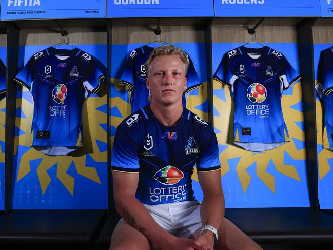 ATTN ATTN EMBARGOED UNTIL 7AM FOR ONLINE EMBARGOEDÃÃ. Cbus Stadium, Mat Rogers and Titans signing Carter Gordon modelling their 2025 jersey. Pics Adam Head