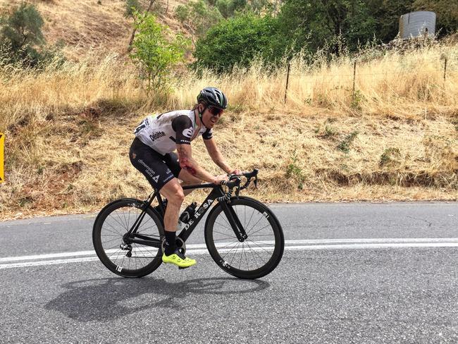 Farrar finishes Stage 3 on a fan’s bike after he crashed near Cudlee Creek. Photo: Anne Fedorowytsch.