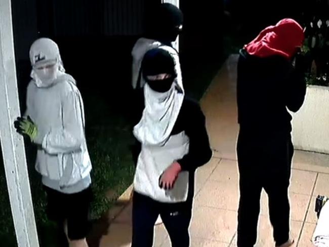 A group of men attempt to break into a Camp Hill home in Brisbane.