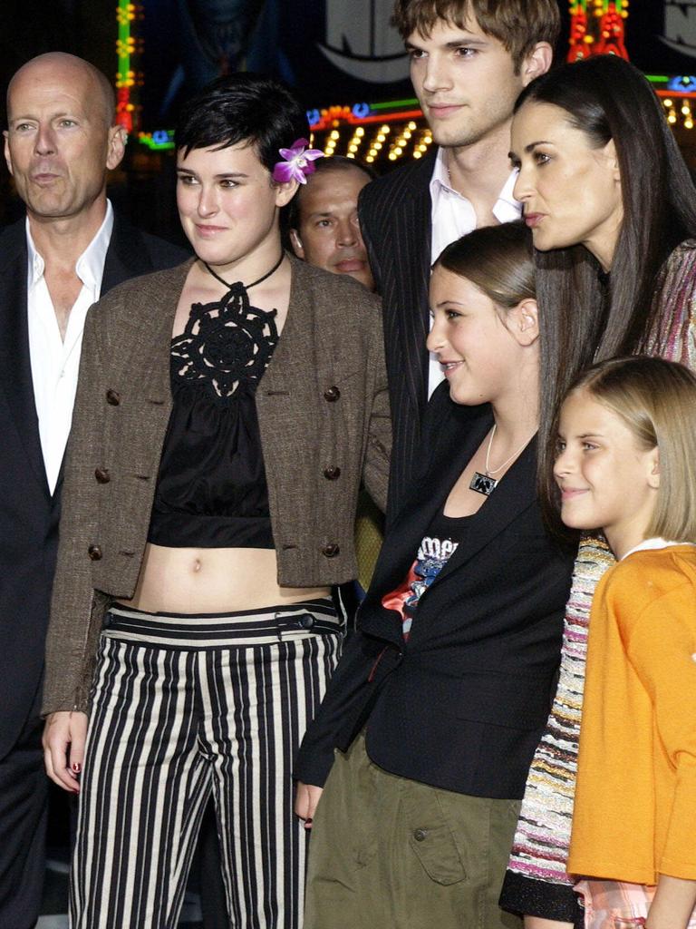 blended families. Demi Moore with exes, Bruce Willis, Ashton Kutcher and kids in 2003. Picture: AP