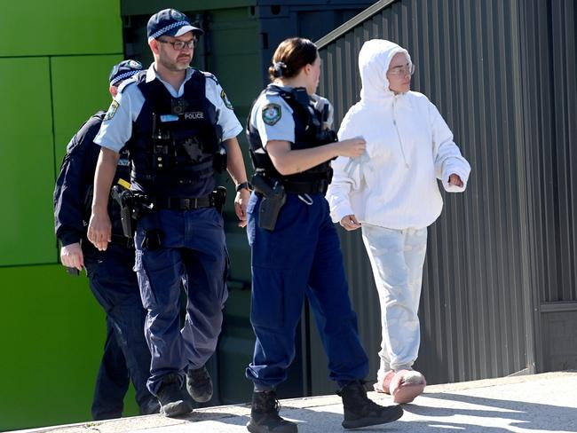 NSW Police arrest Jade Heffer at a petrol station in Greenacre. Picture: Jeremy Piper