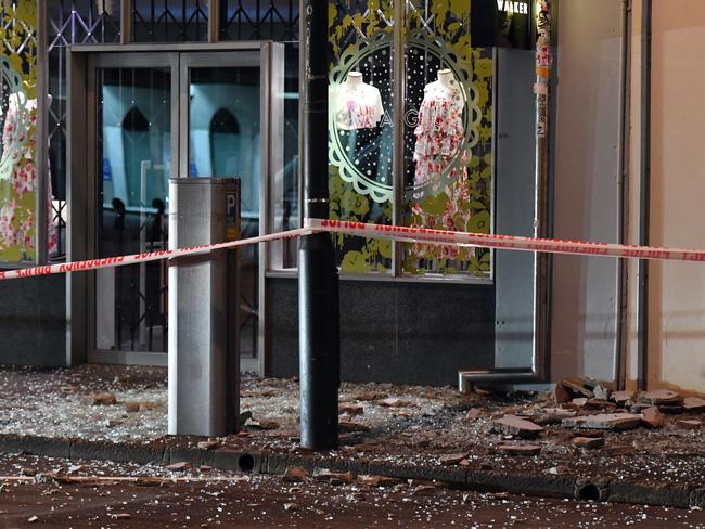 Glass and masonry on the footpath in Wakefield Street, Wellington after a 7.5 earthquake based around Cheviot in the South island shock the capital, New Zealand, Monday, November 14, 2016. (AAP Image/SNPA, Ross Setford) NO ARCHIVING, EDITORIAL USE ONLY